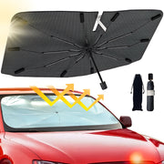 Car windshield sun shade unfolded across a vehicle windscreen to block UV and heat