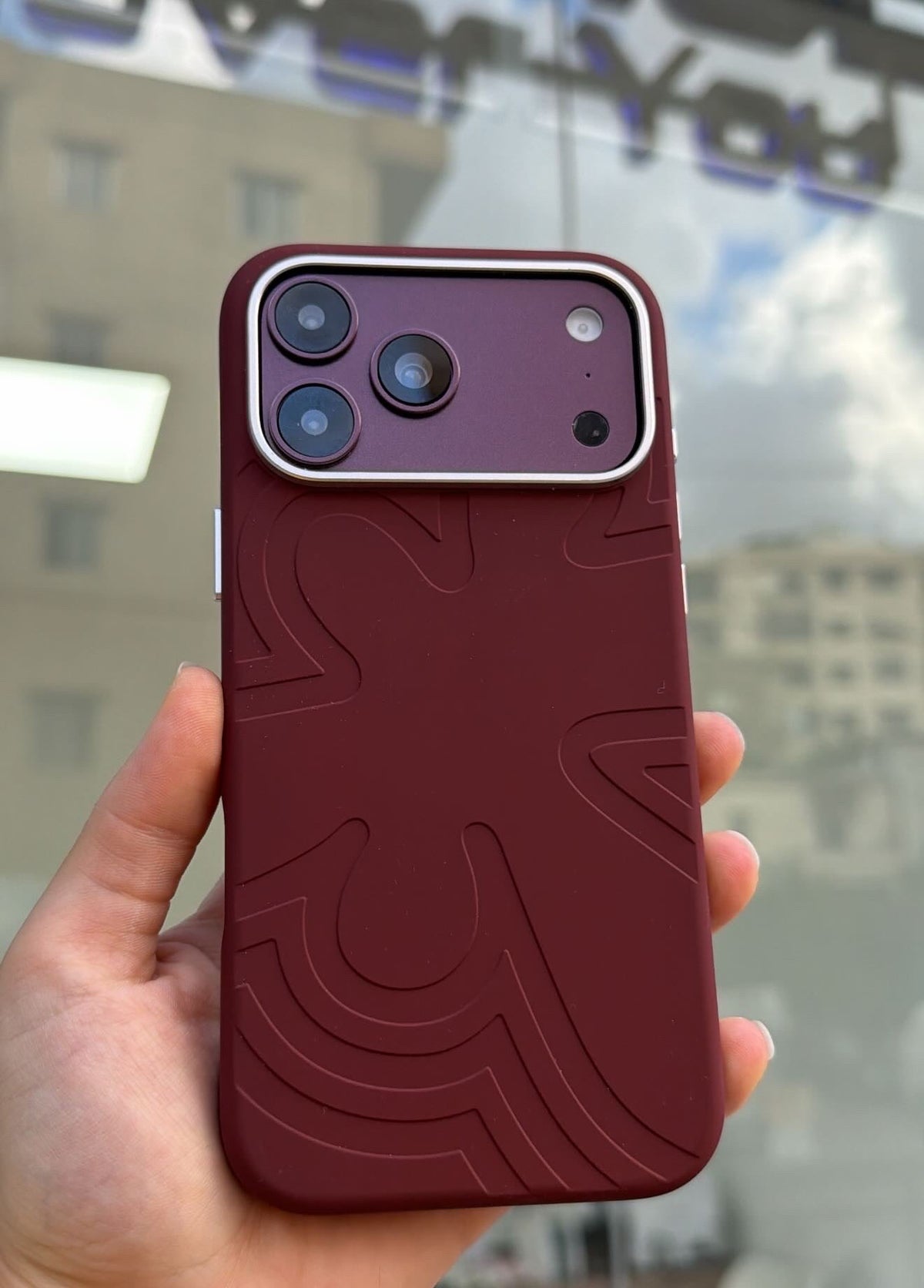 VAWI silicone MagSafe case burgundy fitted on iPhone