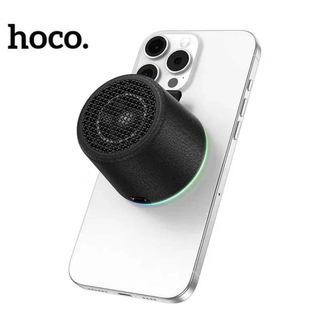 HOCO HC49 mini magnetic bluetooth speaker attached to metal surface
