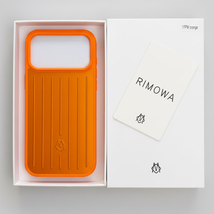 Grooved aluminium iPhone case - held in hand for scale