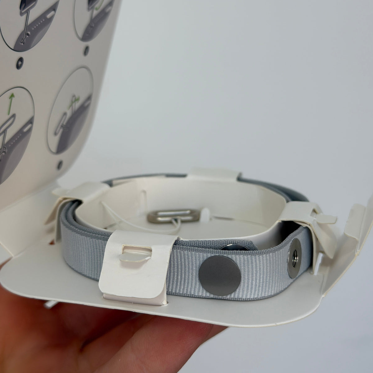 Light blue magnetic woven wrist strap in original packaging with magnetic snap closure