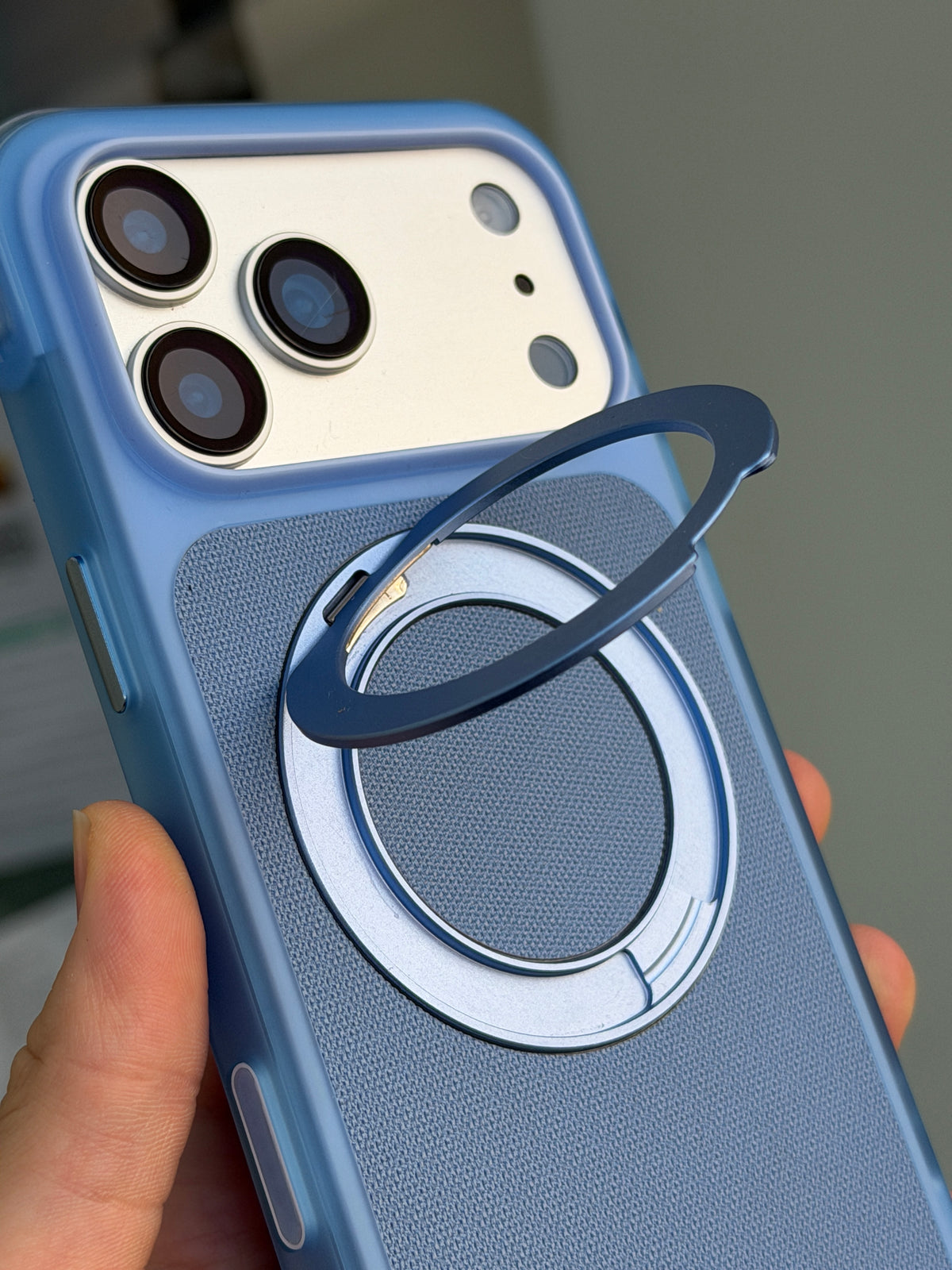 Airbag case light blue - metal ring stand flipped out