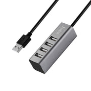 HOCO HB1 USB hub with 4 USB ports connected to laptop
