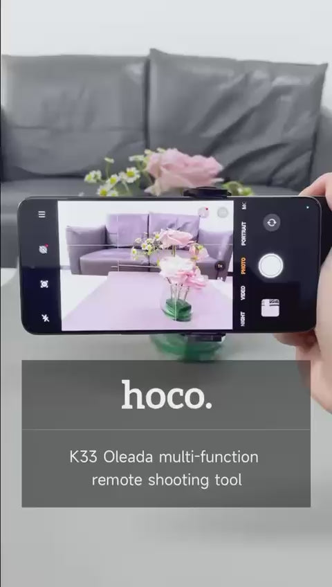 Load video: Hoco K33 Grip Handle with Remote Control – Phone &amp; Camera Stabilizer